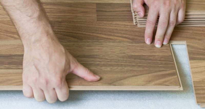 Narrow board laminate flooring showing a typical 'click' connection.