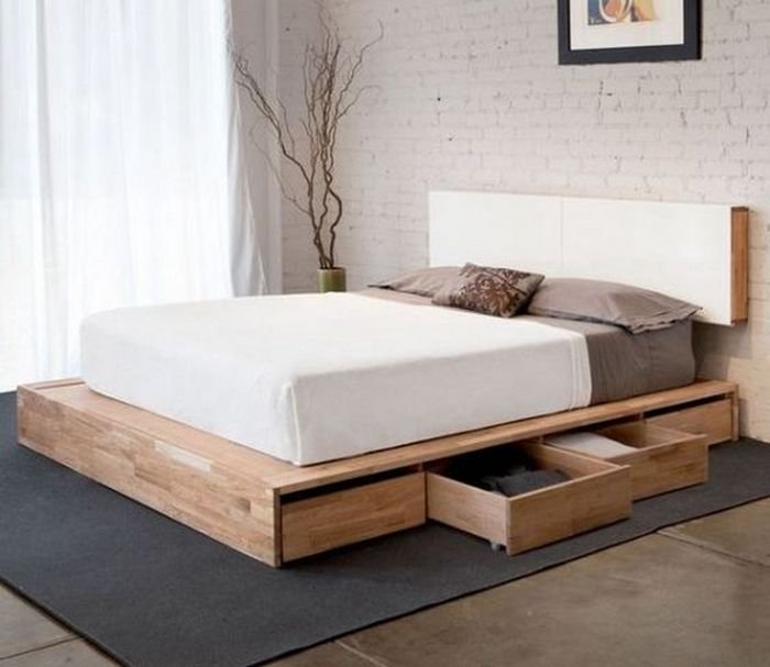 An image of a bed with side drawers. 