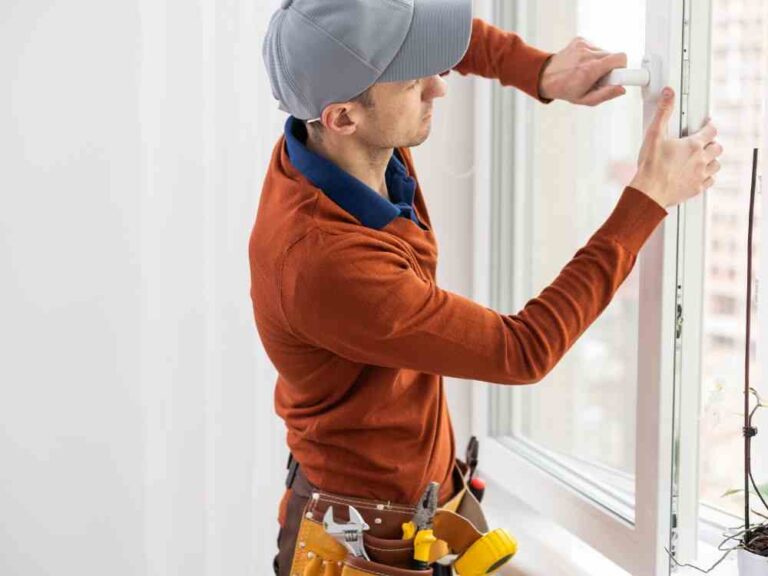 An image of a person doing window screen repair work.