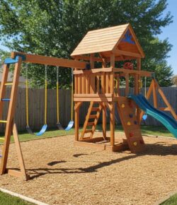 A complete wooden backyard Playground with swings, slide, and climbing frame in a sunny yard with natural wood finish and colorful accents