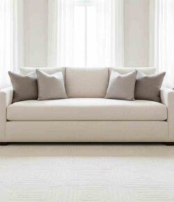 The Complete Room: A wide shot showing a pair of matching tables flanking a sofa to illustrate a high-end, finished look.