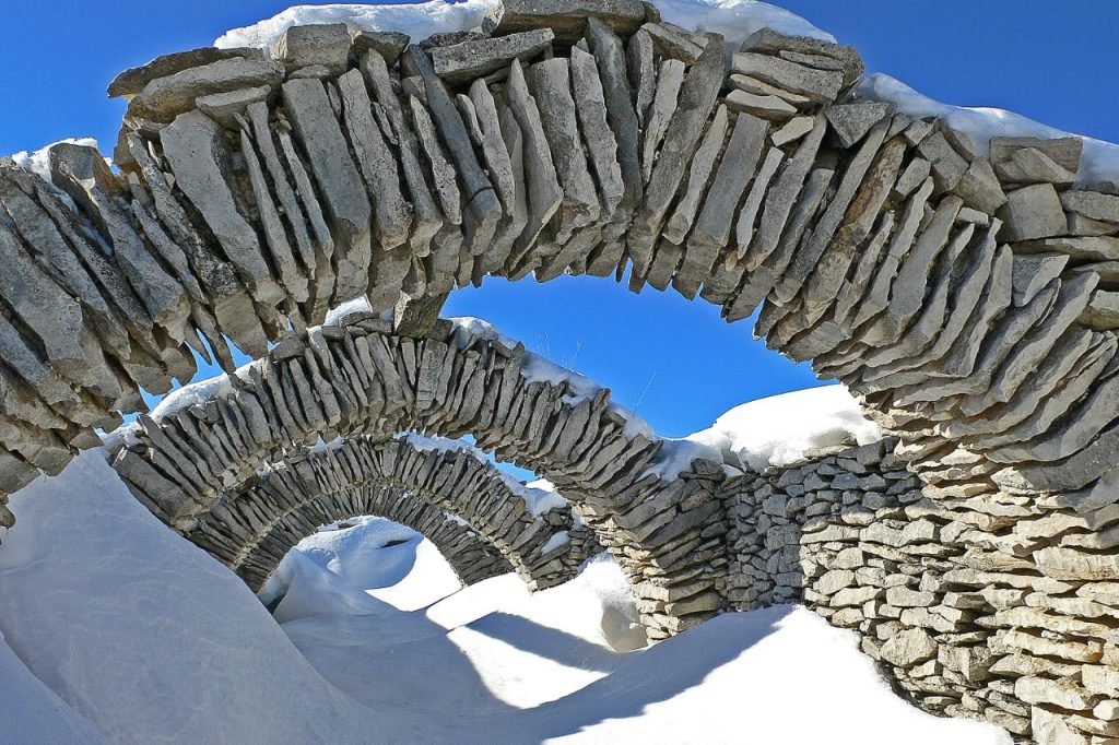 Sheep shelter in snow