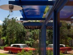 A polycarbonate awning provides heat and glare protection while still allowing plenty of light to pass inside.