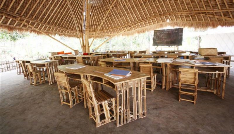 Learn naturally - 100% bamboo desks chairs and chalkboard - inside a Green School classroom