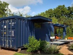 The original container doors provide access to garden shed.