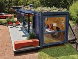 The living roof provides another level of insulation while greatly softening the lines of the container.