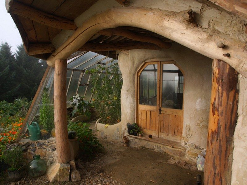 The roof water is collected in a pond for use in the garden.