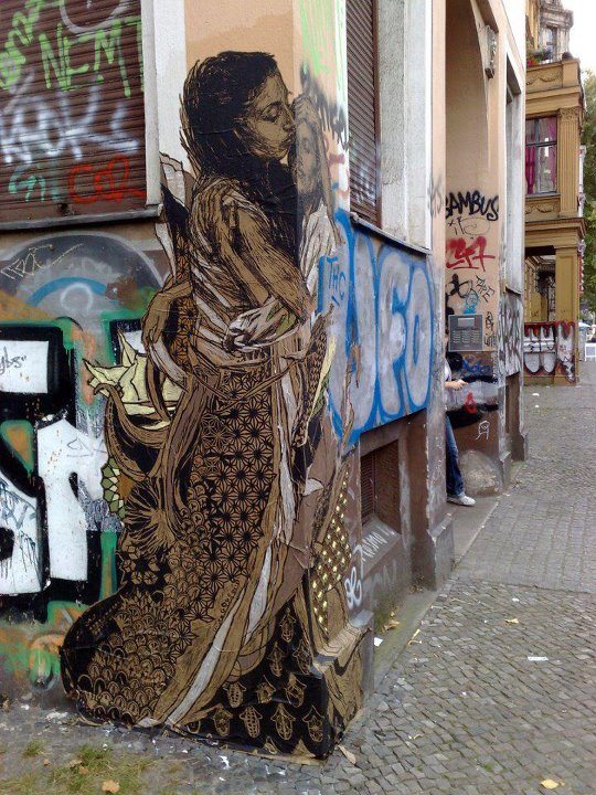If anyone needs a defining line between graffiti and urban art, we think this example is it. This is in Berlin. Is it just me, or do you agree that this is beautiful?