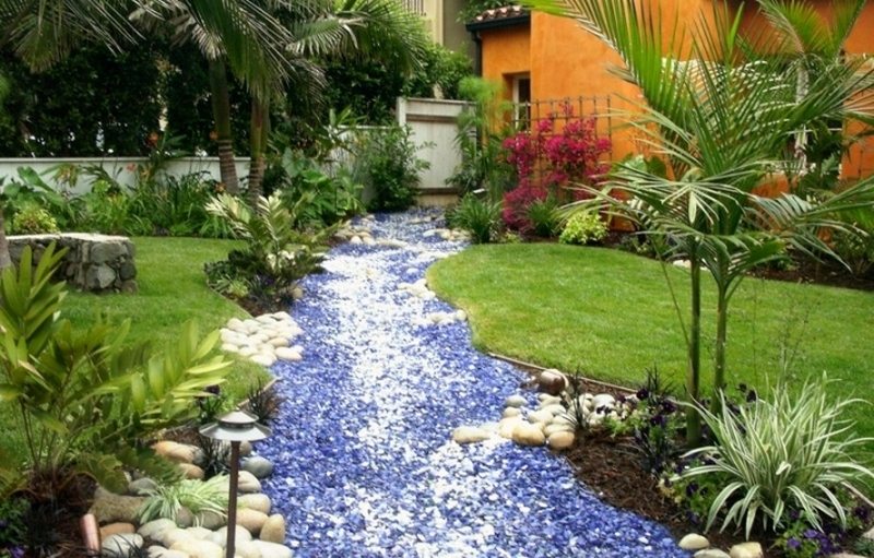 Want a water feature without the water? Then a dry creek bed garden might be for you.