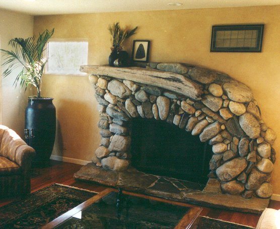 Driftwood and stone fireplace