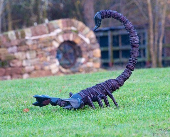 Stacked slate and inuit inspired scorpion sculpture