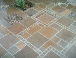 Indian sandstone paving with inset pebble mosaic 'thinking outside the box'