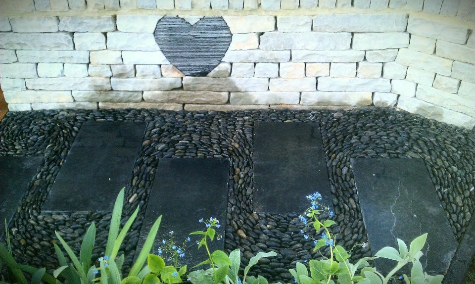 slate heart sculpture, roof slate heart (gold award winning show garden at the 2012 Harrogate Spring flower show) — at Harrogate Flower Show.