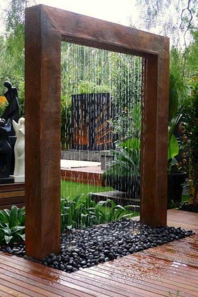 Is it a water feature, an outdoor shower or some combination of both? No matter what it is, I think it would be refreshing on a hot day.