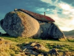 Built in 1974 as a family rural retreat, this house in northern Portugal is so perfectly integrated into its natural surroundings that it was constructed between four large boulders found on site.  Ironically, the current owners have had to move from their remote retreat as it has drawn so much attention for the similarity it has to a certain cartoon, that they were inundated with tourists.  So, what does this house remind you of? Are you brave enough to admit you saw the original cartoon, or only confess to seeing the reruns? Maybe you could just share it and see what others think?
