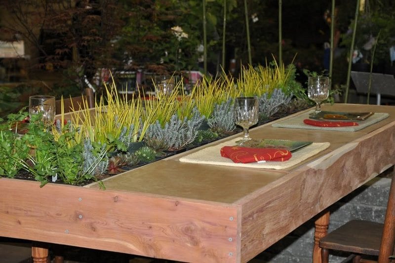 Here’s another good example of an outdoor dining table with a living centrepiece!  Pick your own salad? What would you plant?