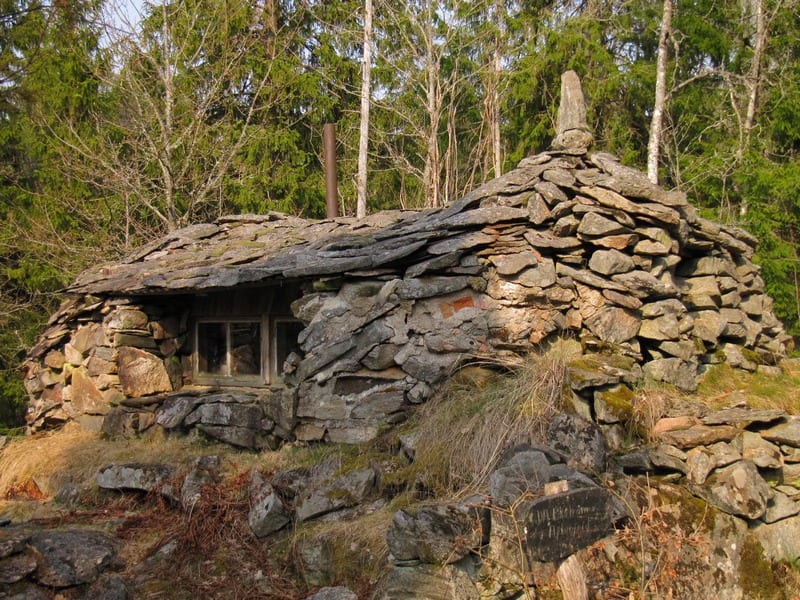Somewhere in Sjolanda Sweden you'll come across this stone cottage built by hand by the owner from stones gathered whilst walking in the forest.