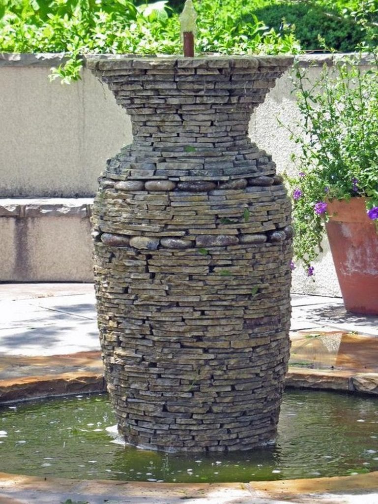 Wondering how you can make use of dry stone wall techniques?  Why not try building a water feature like this?