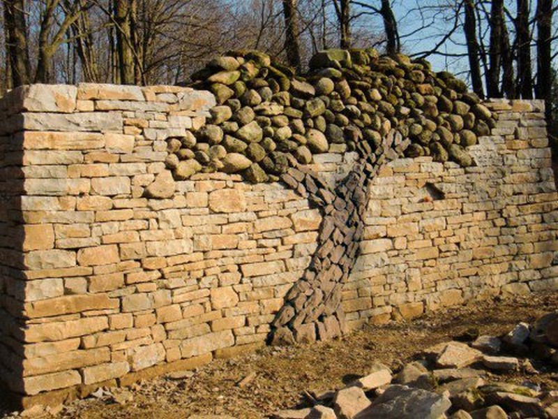 In the spirit of the dry stone firepit we showed you earlier, here is a stunning dry stone wall, designed and built by Eric Landman. This wall is built in a conservation area in Orangeville, Ontario, as a memorial to his late wife Kerry Landman.  Love it or loathe it? Would you ever attempt a project as complicated as this?