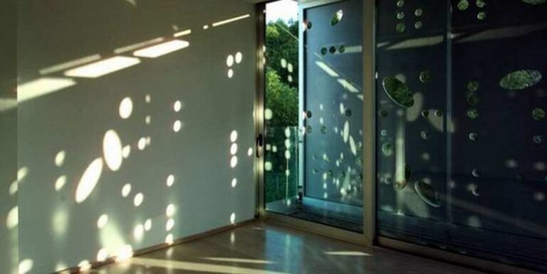 C+V House - using metal screens to play with light and shadow...