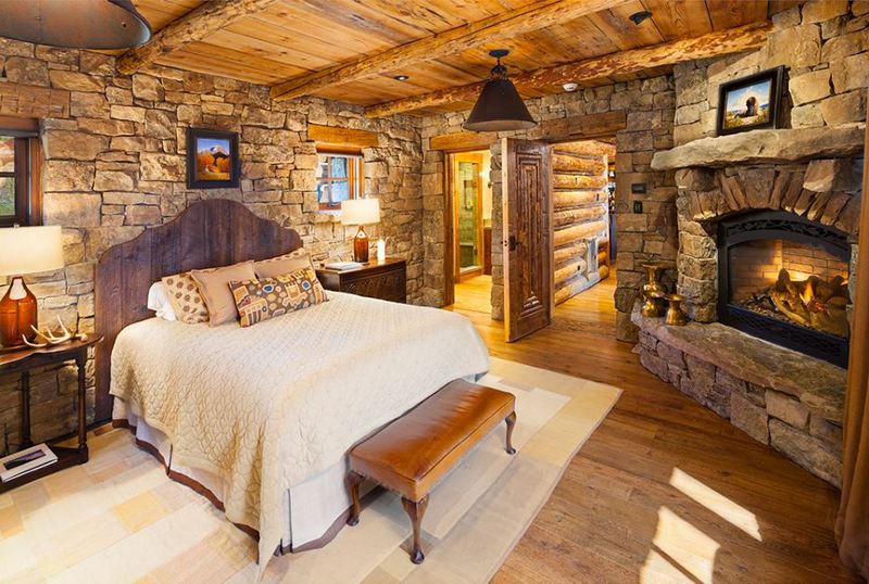 This bedroom has 'rustic' written all over it. If you were to redesign it, what changes would you make?