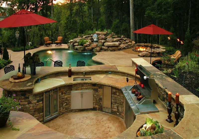It's got a pool, a water feature, a fire pit, an outdoor kitchen, a big outdoor entertaining area and a view. What else do you think is missing?