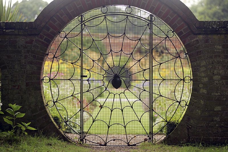 We know some of you don't like spiders, but we can’t help but share this garden gate. Thumbs up or thumbs down?