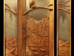 Eagle and fish entry door by Ron Ramsey of Lake Tahoe