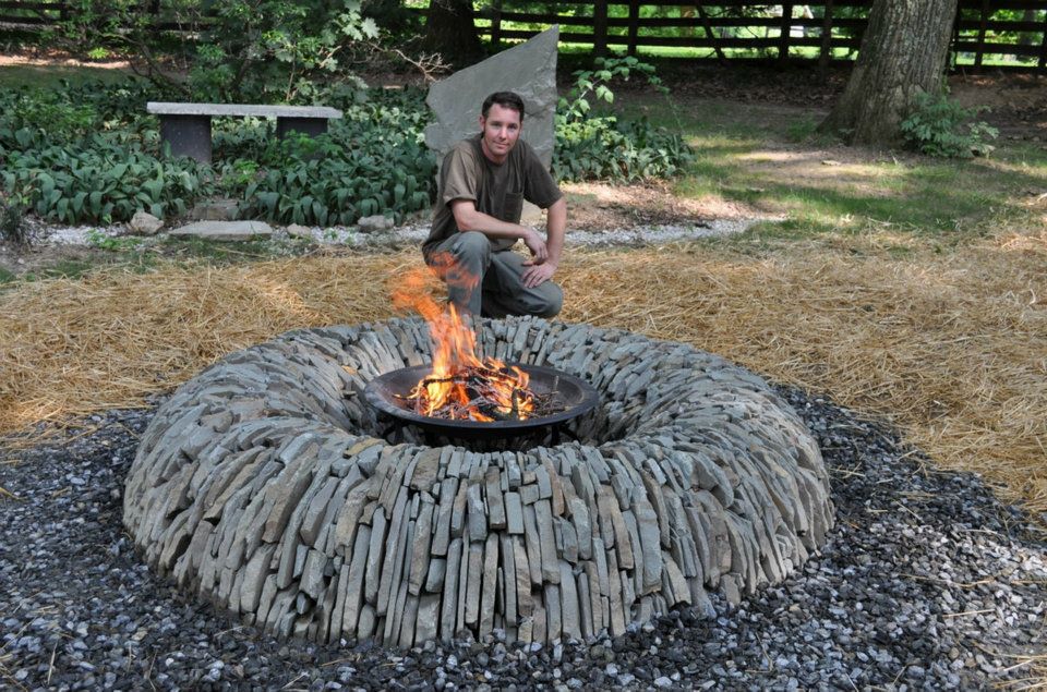 Still looking for that perfect fire pit? How about this split stone donut one. It's a hybrid dry stone wall and fire pit. Great if you have a small area and like the idea of both.