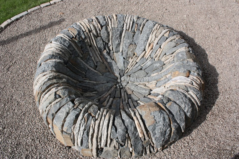 Callum Gray Stone posted this on our wall but it is far too lovely to let it slip into FB obscurity. We're sticking it here on our page for all to enjoy. What do you think - is this a magnificent fire-pit or what? I really don't know that I could bring myself to light that first fire!  BTW - there is not a single gram of mortar used. It's all dry stone work.