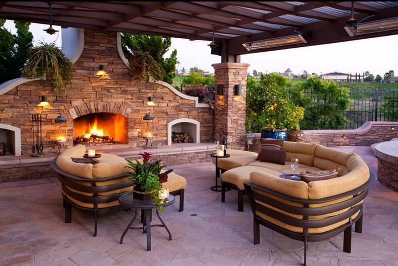 We love the comfy seating and the open fire in this outdoor space. How about you? What features would you add or remove?