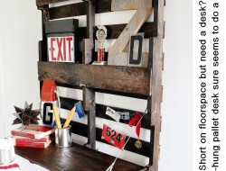 This wall-hung pallet desk is a very cheap solution when floor space is limited.