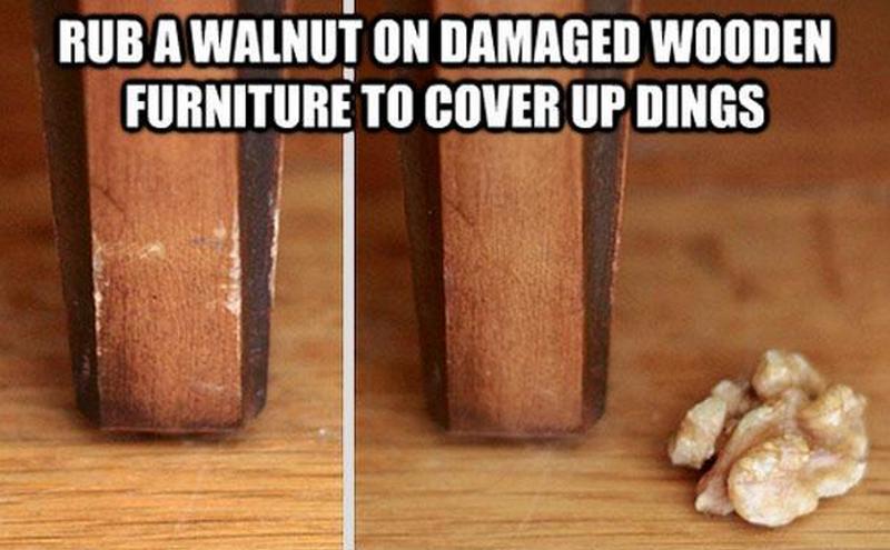 Rub a walnut on damaged wooden furniture to cover up dings.