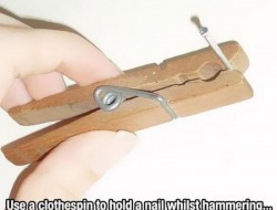 Use a clothespin to hold a nail whilst hammering.