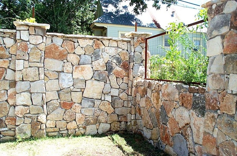 Privacy Wall with Stone and Steel - DIRTCO Construction
