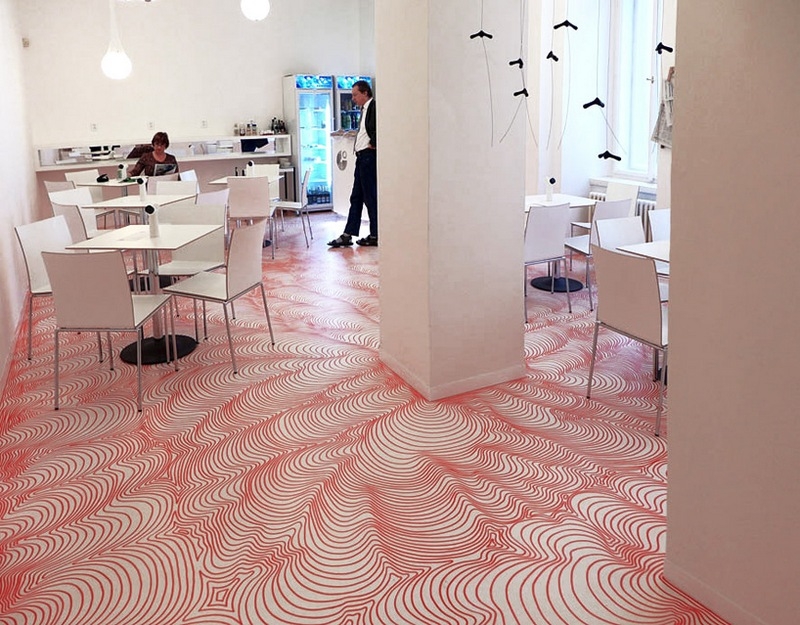 German Artist Draws On A Cafe Floor With Permanent Marker