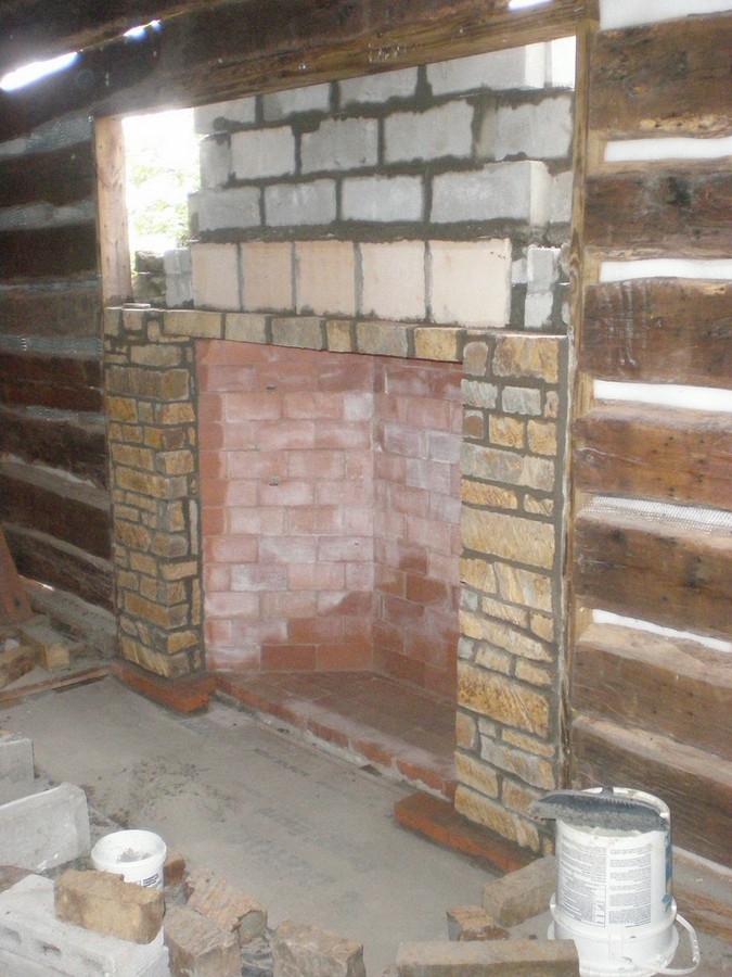 The fireplace nearing completion
