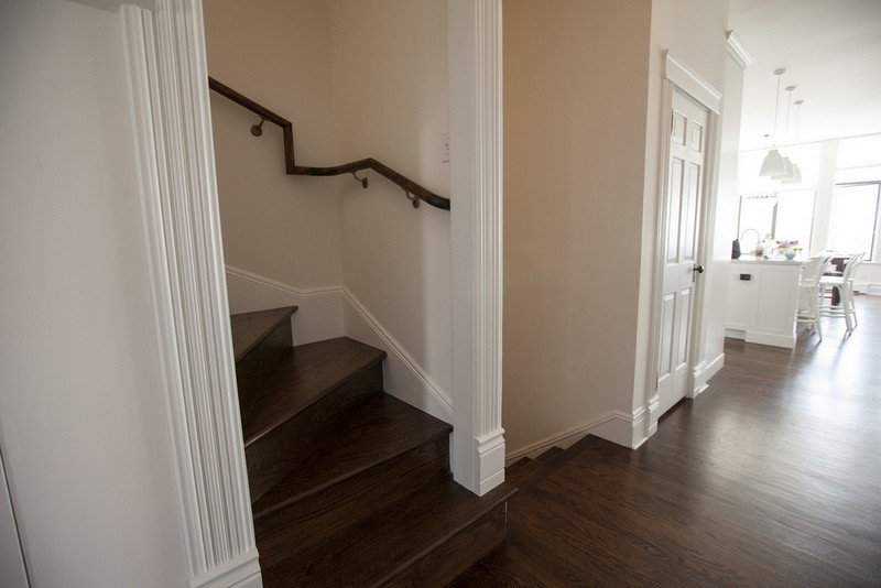 As you walk up the stairs, the area opens up to the 2nd floor Master flat, with an open kitchen and living room.