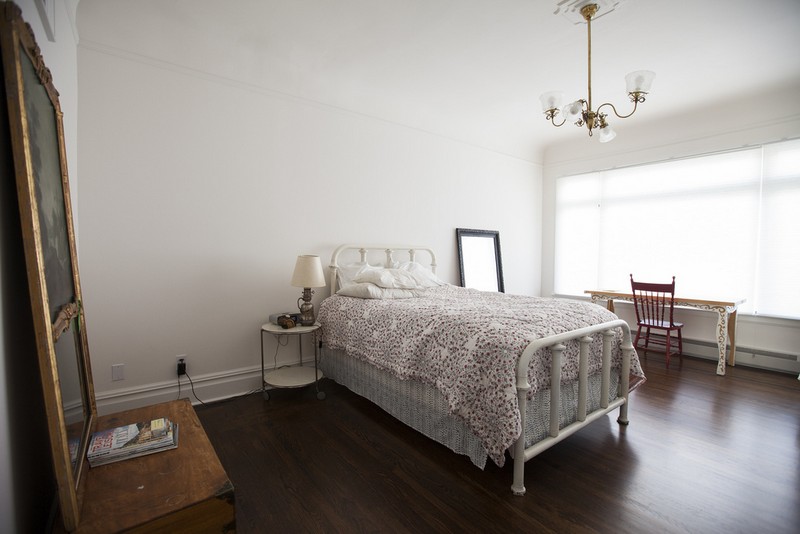 There are two bedrooms in the downstairs flat, now both feel fresh and airy with their newly painted walls and dark wood floor.
