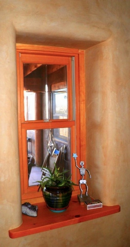 H and H Straw Bale Home - Plastered window in Straw Bale wall with a Douglas FIr sill