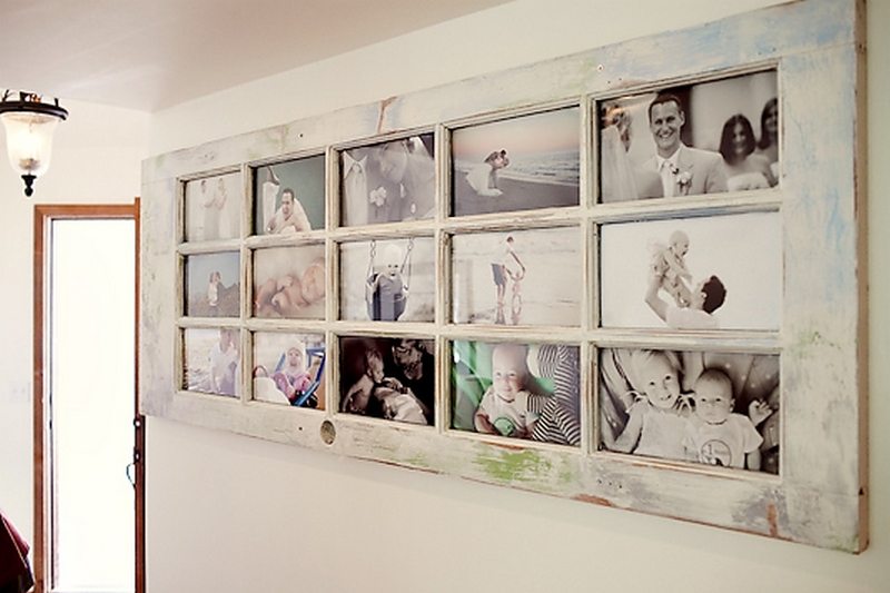 old glass door turned into a picture gallery for a creative way to hang pictures