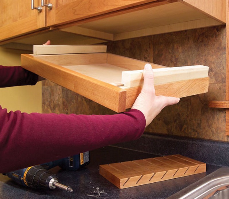 I install a 'The Drop Block' under cabinet knife storage 