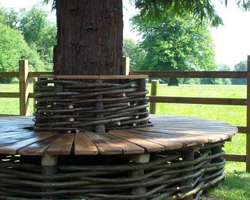 We love to spend time under the trees sitting and reading. If you do too, then you'll surely love these tree benches!