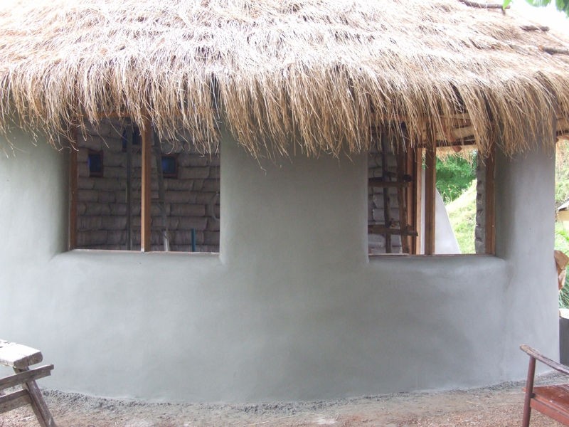 DIY Earthbag Round House - Cement Plaster on Exterior Walls