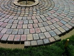 DIY Patio with Fire Pit - Ensuring Pavers are Well Spaced.