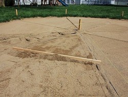 DIY Patio with Fire Pit - Checking The Level of the Sand