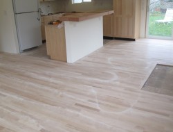 DIY Reclaimed Wood Flooring - Sanded and sealer coating