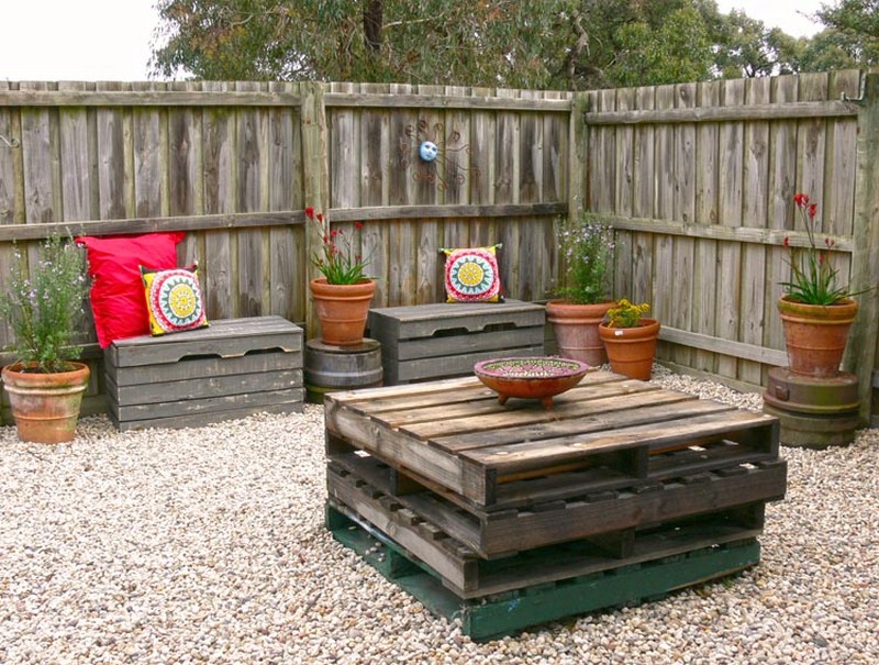 Small courtyard area with pallet furniture.