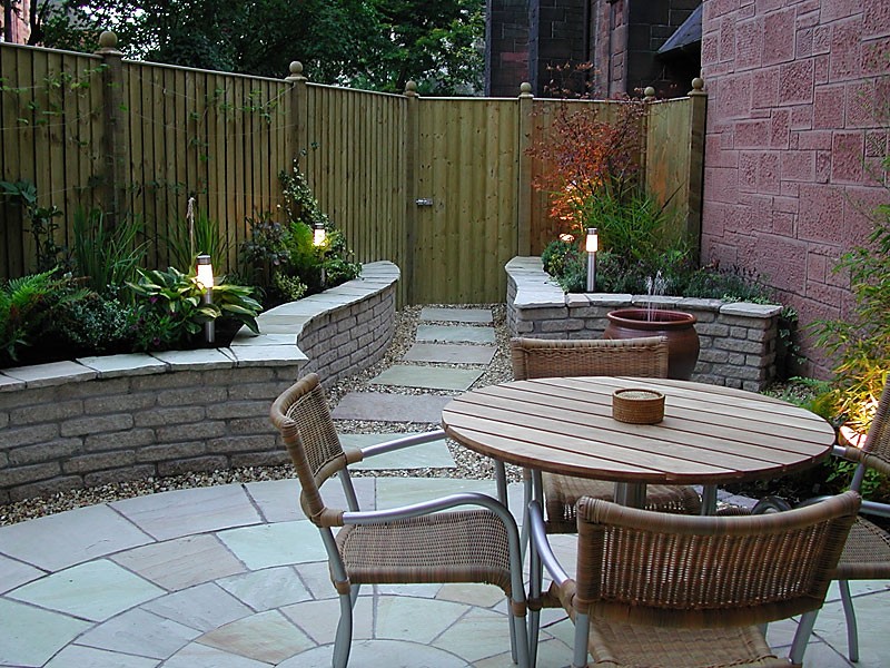 Stone paved courtyard with garden path.