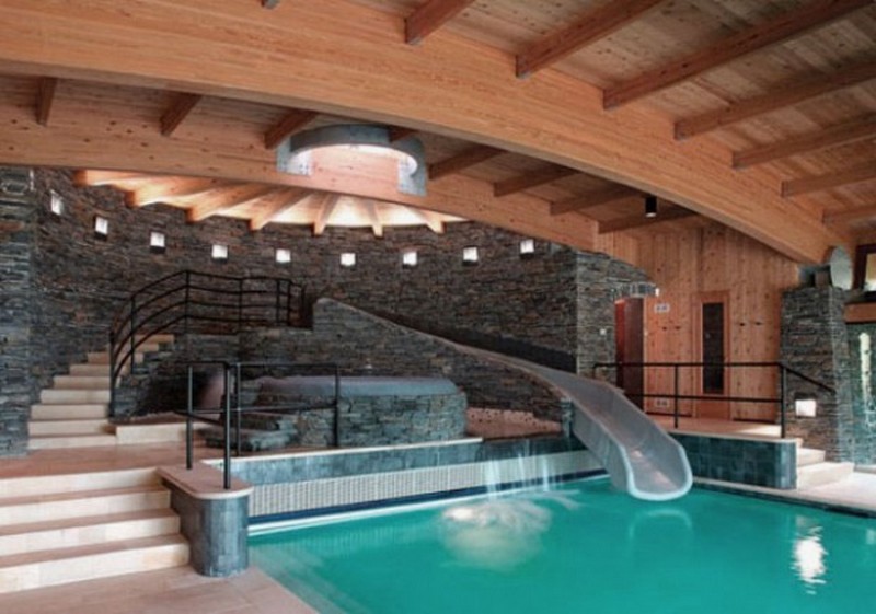 Indoor Pool Design with Cool Slide and Wooden Ceiling  - Remals